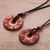 Ceramic pendant necklaces, 'Enchanted Land' (pair) - Pair of Red and Black Ceramic Pendant Necklaces from Peru (image 2b) thumbail
