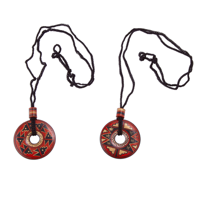 Ceramic pendant necklaces, 'Enchanted Land' (pair) - Pair of Red and Black Ceramic Pendant Necklaces from Peru