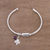 Amethyst cuff bracelet, 'Fortune Smiles' - Sterling Silver Clover Charm and Amethyst Bead Cuff Bracelet