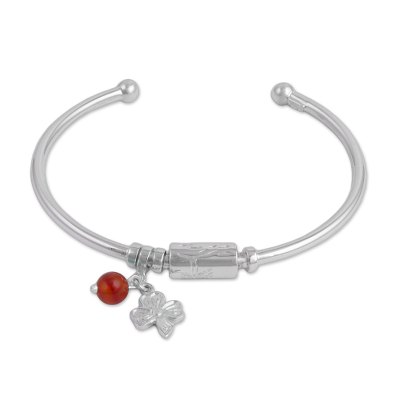 Carnelian charm cuff bracelet, 'Fortune Smiles' - Sterling Silver Clover Charm Carnelian Bead Cuff Bracelet