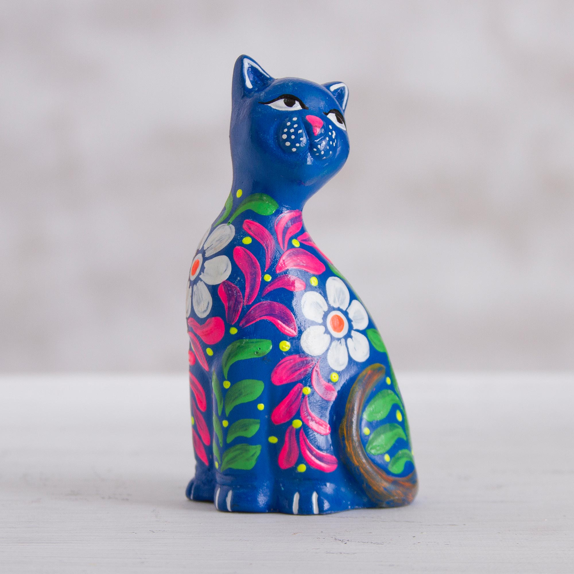 blue ceramic cat figurine