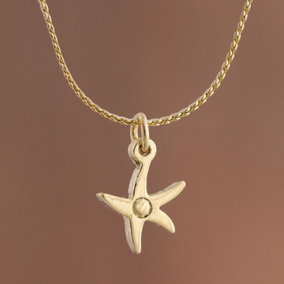 Gold plated sterling silver pendant necklace, 'Twinkling Star' - Gold Plated Sterling Silver Star Necklace from Peru