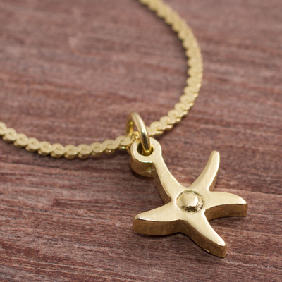 Gold plated sterling silver pendant necklace, 'Twinkling Star' - Gold Plated Sterling Silver Star Necklace from Peru