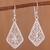Sterling silver filigree dangle earrings, 'Gleaming Royal Scroll' - Gleaming Sterling Silver Filigree Kite Dangle Earrings thumbail
