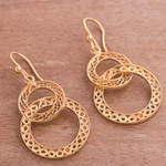 Gold plated filigree dangle earrings, 'Looped in Gold' - Gold-Plated Sterling Silver Filigree Circles Dangle Earrings