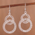 Sterling silver filigree dangle earrings, 'Gleaming Loops' - Gleaming Sterling Silver Filigree Circles Dangle Earrings (image 2) thumbail