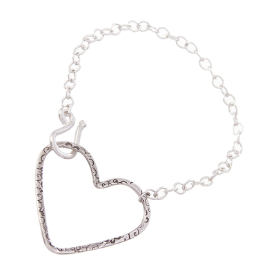 Sterling silver pendant bracelet, 'Tugged Heart' - Handcrafted Sterling Silver Textured Heart Pendant Bracelet