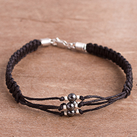 Hematite wristband bracelet, 'Dark Elegance' - Hand-Braided Cotton and Hematite Bracelet from Peru
