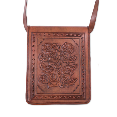 Leather sling, 'Field of Roses' - Floral Motif Embossed Leather Sling from Peru