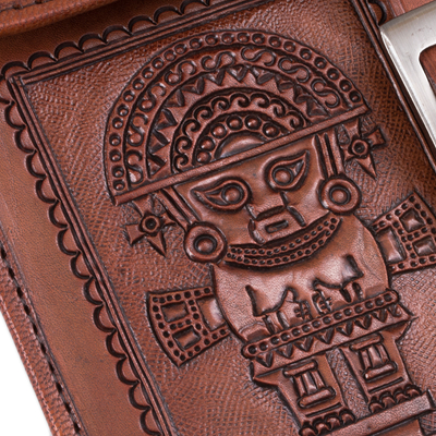 Leather sling, 'Inca Mythology' - Tumi Motif Embossed Leather Sling from Peru