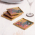 Reverse-painted glass coasters, 'Artisanal Color' (set of 4) - Colorful Reverse-Painted Glass Coasters from Peru (Set of 4) (image 2) thumbail