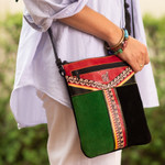 Leather sling, 'Cusco Traveler' - Llama-Themed Multicolored Leather Sling from Peru