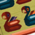 Wool placemats, 'Amazonian Parrots' (set of 4) - Parrot-Themed Wool Placemats from Peru (Set of 4) (image 2f) thumbail