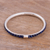 Lapis lazuli bangle bracelet, 'Beautiful Tunnel' - Lapis Lazuli Beaded Silver Bangle Bracelet from Peru