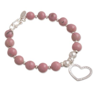 Rhodonite beaded bracelet, 'Love Fascination' - Rhodonite Beaded Bracelet with Heart Charm from Peru