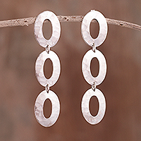 Sterling silver dangle earrings, 'Oval Dimension' - Hammered Oval Sterling Silver Dangle Earrings from Peru