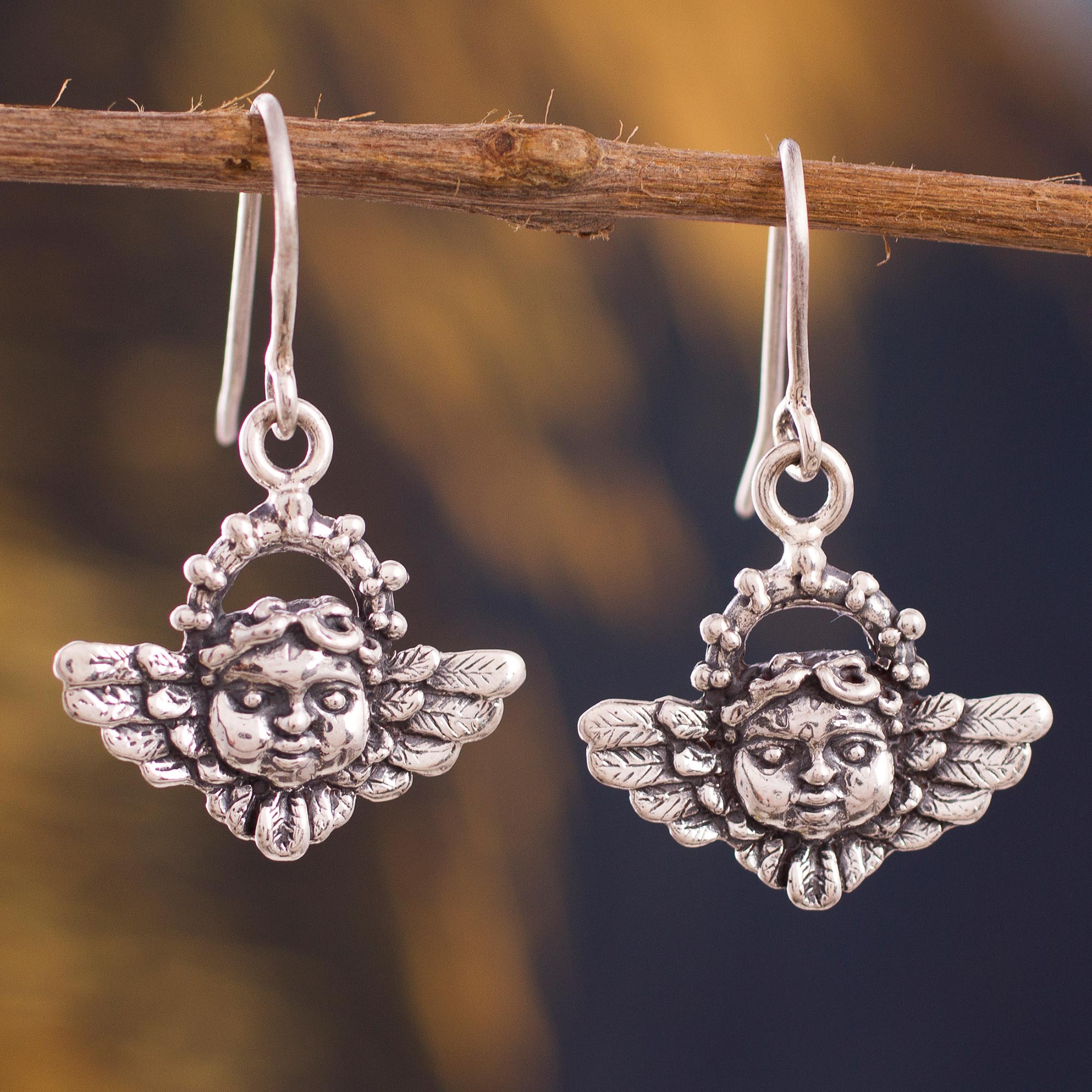 silver cherub earrings