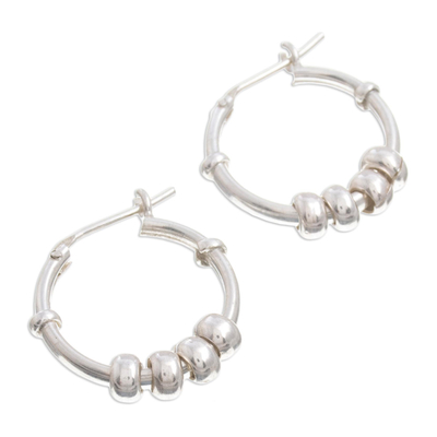 Sterling silver hoop earrings, 'Swing and Sway' - Sterling Silver Hoop Earrings with Sliding Rings from Peru
