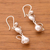 Sterling silver dangle earrings, 'Delightful Cats' - Cat-Themed Sterling Silver Dangle Earrings from Peru