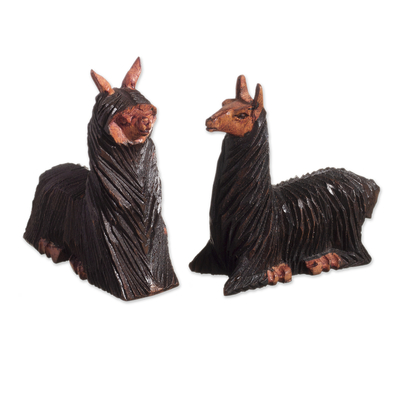 Wood figurines, 'Calm on the Mountain' (pair) - Cedar Wood Figurines of a Lying Llama and Suri Alpaca (Pair)
