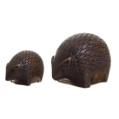 Wood figurines, 'Mother Hedgehog' (pair) - Cedar Wood Hedgehog Figurines from Peru (Pair)