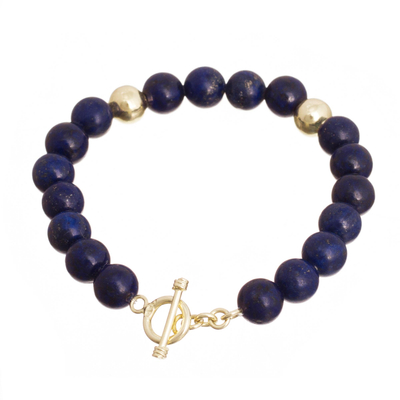 Gold accent lapis lazuli beaded bracelet, 'Golden Sea' - Gold Accent Lapis Lazuli Beaded Bracelet from Peru