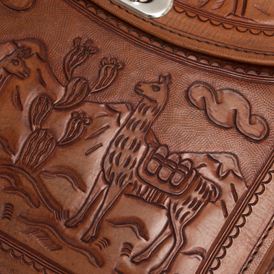 Leather sling shoulder bag, 'Andean Tale' - Hand-Tooled Embossed Andean Scene Brown Leather Shoulder Bag