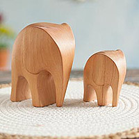 Cedar wood figurines, 'Brown Elephant Motherhood' (pair) - Cedar Wood Elephant Mother and Child Figurines (Pair)