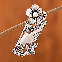 Silver brooch, 'Natural Universe' - Peruvian Silver Brooch of a Hand Clutching a Flower