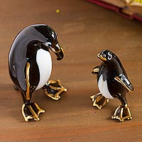 Featured review for Blown glass figurines, Penguin Motherhood (pair)