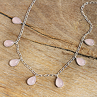 Rose quartz pendant necklace, 'Poem' - Natural Rose Quartz Pendant Necklace