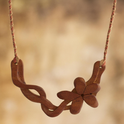 Wood pendant necklace, 'Jasmine Bloom' - Floral Wood Pendant Necklace on Cotton Cord
