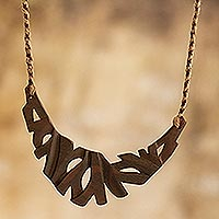 Wood pendant necklace, 'Mountain Muse' - Hand Crafted Wood Pendant Necklace from Peru