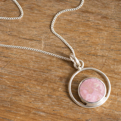 Rhodonite pendant necklace, 'In the Loop' - Rhodonite and Sterling Silver Pendant Necklace from Peru