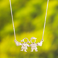 Sterling silver pendant necklace, 'Brother and Sister' - Boy and Girl Sterling Silver Pendant Necklace