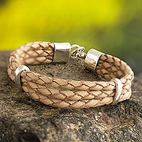 Sterling silver and leather cord bracelet, 'Brilliant Furrows' - Braided Natural Leather Bracelet with Sterling Silver Accent