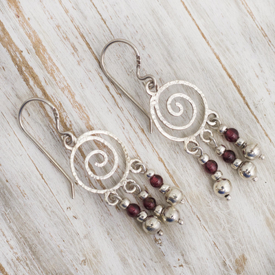 Garnet chandelier earrings, 'Spiral Nebula' - Spiral Sterling Silver Earrings with Garnets