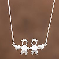 Sterling silver pendant necklace, 'Sons' - Sons Sterling Silver Pendant Necklace from Peru
