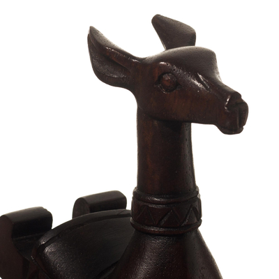 Wood phone holder, 'Andes Vicuña' - Hand-carved Vicuña Wood Phone Holder From Peru