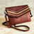 Leather convertible handbag, 'Andean Summer' - Tooled Leather Convertible Messenger Wristlet Bag from Peru