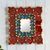 Reverse-painted glass wall accent mirror, 'Cusco Treasure in Crimson' - Red and Blue Wall Accent Mirror
