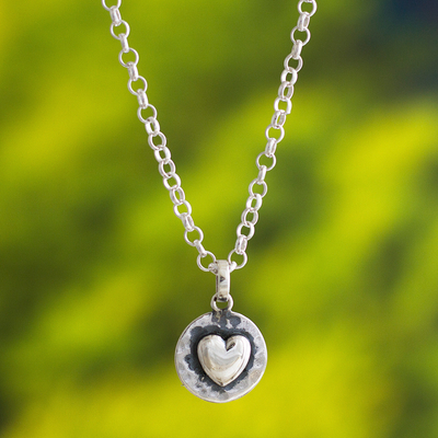 Sterling silver pendant necklace, 'Unconditional Love' - Handcrafted Heart-Themed Sterling Silver Necklace from Peru