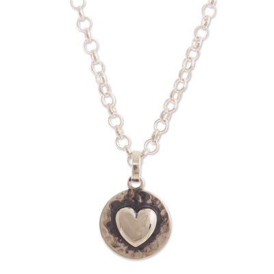 Sterling silver pendant necklace, 'Unconditional Love' - Handcrafted Heart-Themed Sterling Silver Necklace from Peru