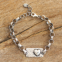 Sterling silver link bracelet, 'Special Love' - Heart-Themed Pendant Link Bracelet from Peru