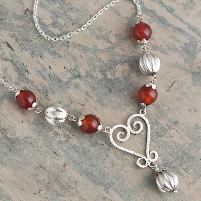 Carnelian pendant necklace, 'Carnelian Heart' - Carnelian Beaded Pendant Necklace from Peru