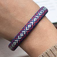 Natural fiber bangle bracelet, 'Radiant Energy' - Handwoven Bangle Bracelet from Colombia