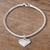 Sterling silver charm bracelet, 'Shining Heart' - Modern Heart Charm Bracelet from Peru