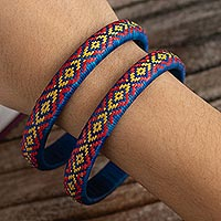 Natural fiber bangle bracelets, 'Colombian Sky' (pair) - Multicolored Natural Fiber Bangles (Pair)