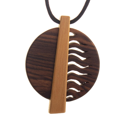 Wood pendant necklace, 'Rescued Spirit' - Guayacan and Aguano Masha Wood pendant on Nylon Cord