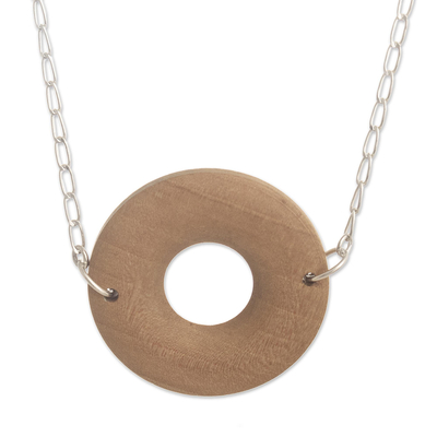 Wood pendant necklace, 'Nature Circle' - Pumaquiro Wood and 925 Sterling Silver Pendant Necklace